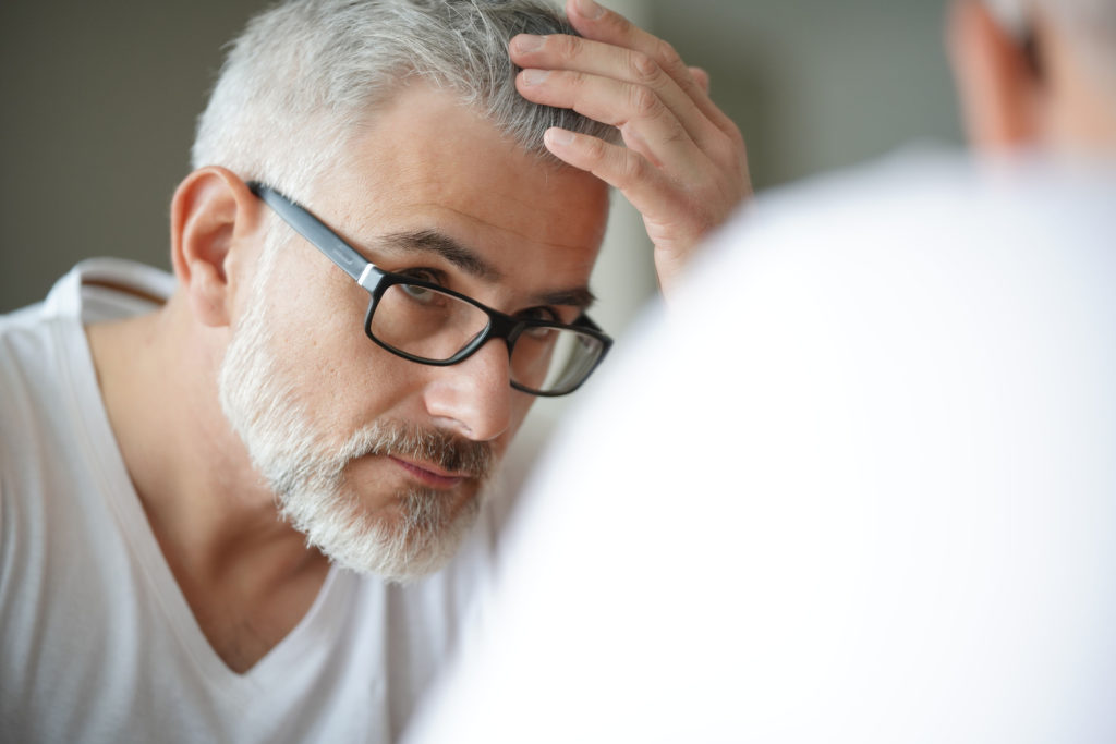 Keeping A Positive Mental Attitude After Losing Your Job bigstock Portrait of man concerned by h 349074850 1 1024x683 - Keeping A Positive Mental Attitude After Losing Your Job