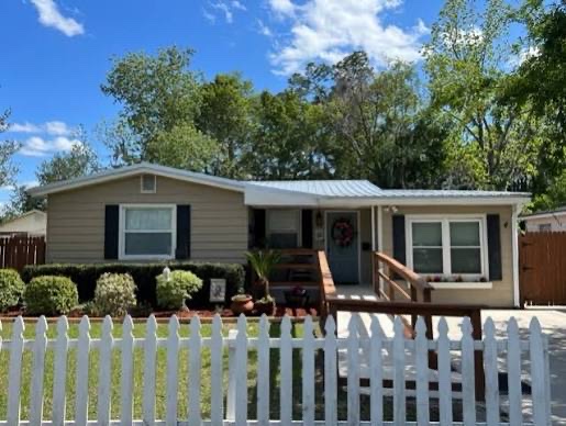 The Clair Winston House in Macclenny, a one-story home behind a white picket fence